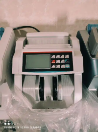 cash currency note counting machine with fake note detection.